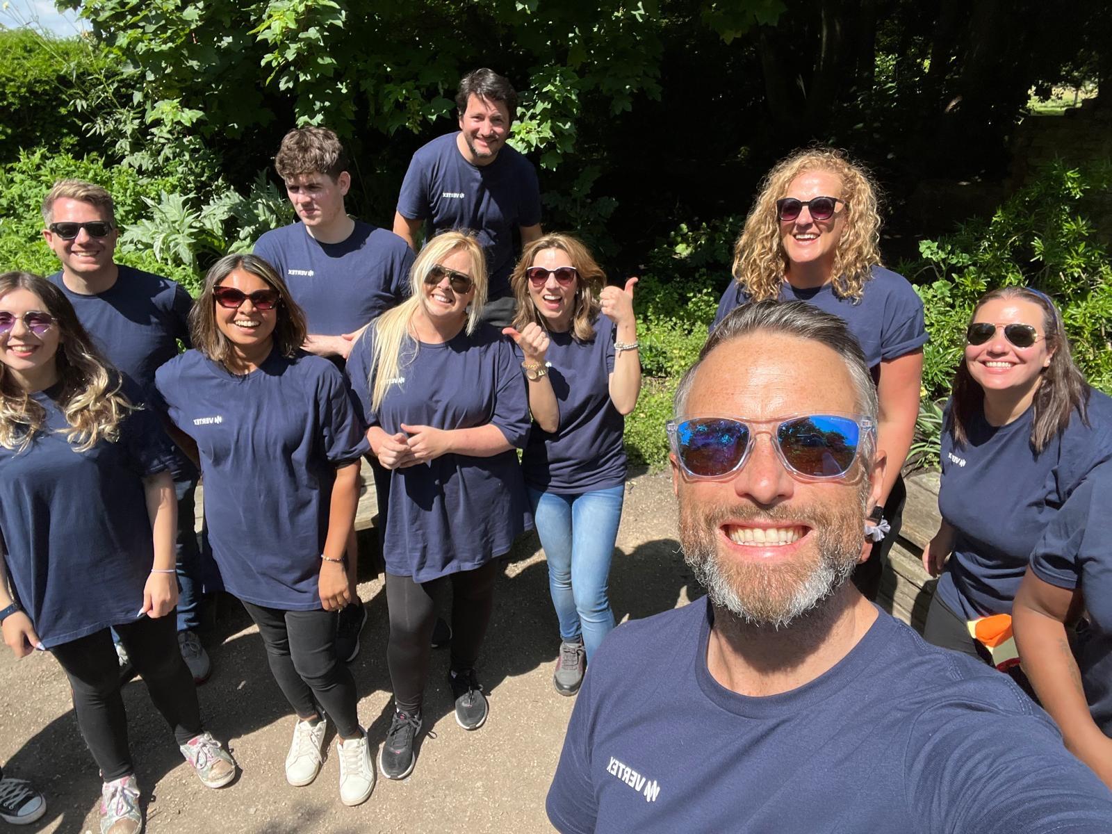 Vertex employees volunteer to pick up trash from local parks.